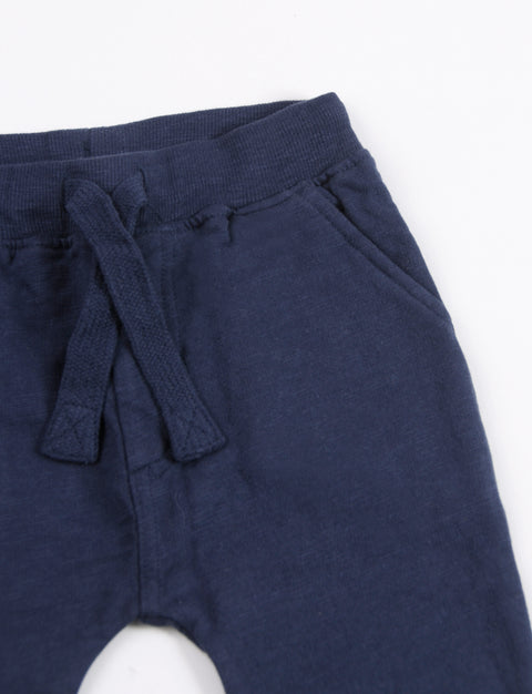 Pantalon con cintura y puño en rib
