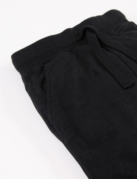 Pantalon con cintura y puño en rib