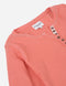 T-shirt con media cartera de botones